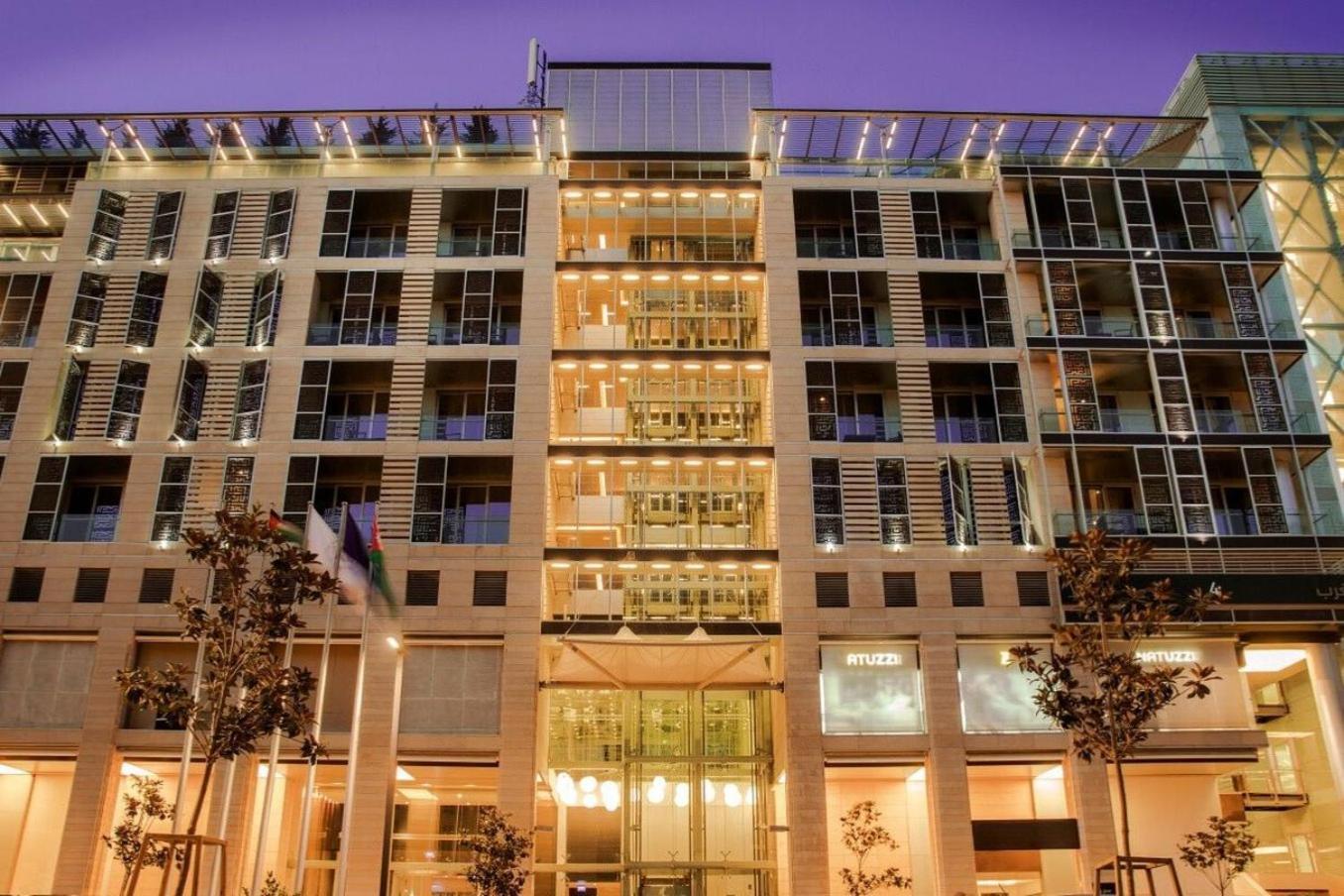 The Abdali Boulevard Hotel Амман Экстерьер фото The hotel at night