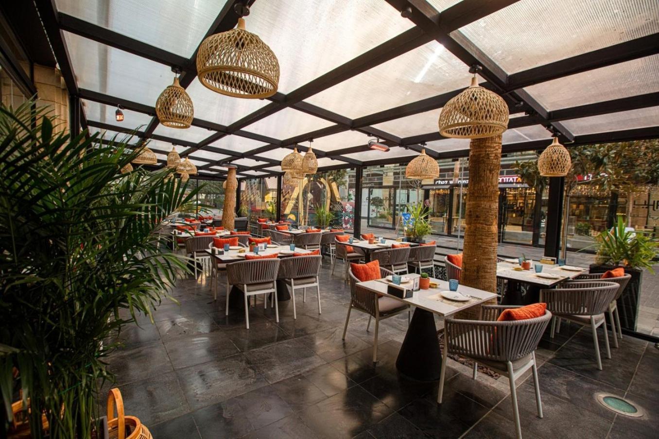The Abdali Boulevard Hotel Амман Экстерьер фото The interior of the restaurant